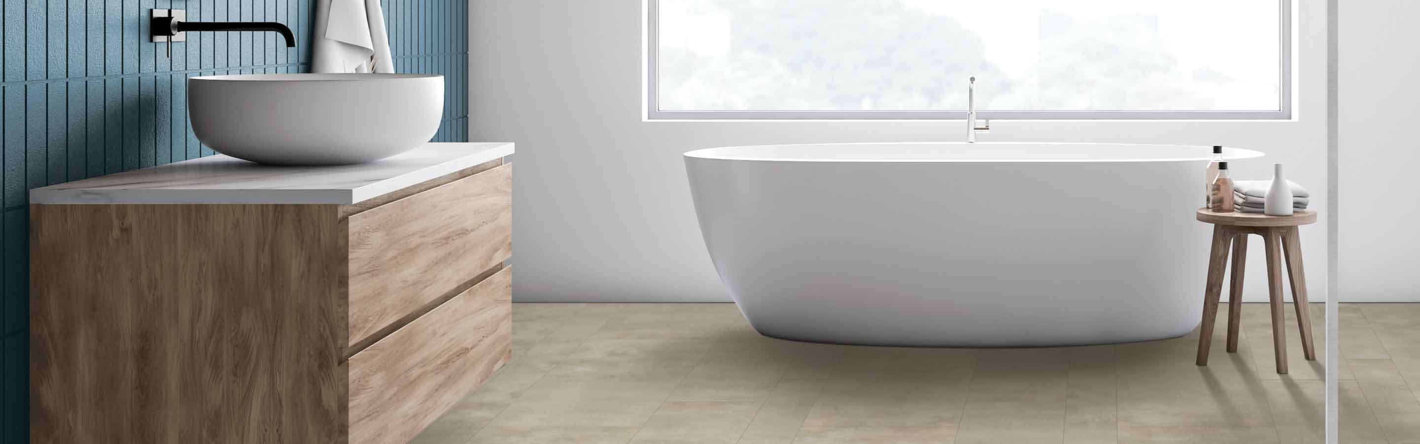 stone look vinyl in bathroom with wood beams, blue accent wall and white deep soak tub