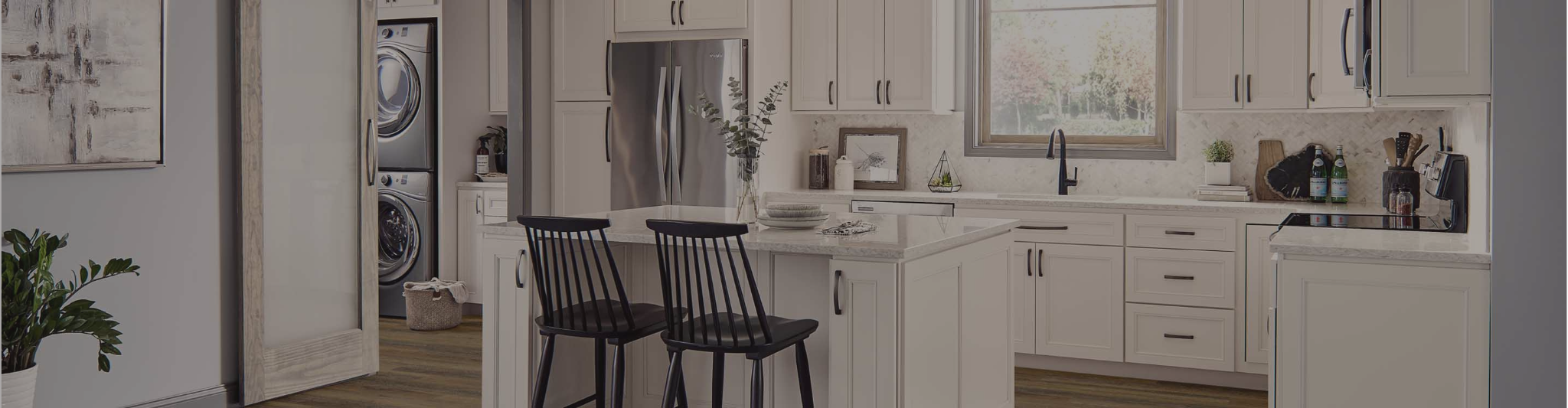 white cabinetry and countertops in a kitchen with wood-look flooring